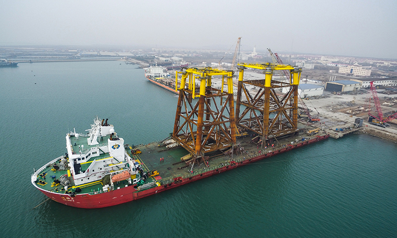 近日，中国海油渤海油田旅大5-2北油田I期开发项目机械完工。图为PAP WHPA导管架陆地完工装船。
